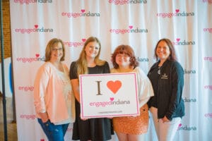 4 Women Standing with the Slogen of " I love Engaged Indiana "